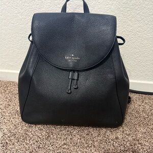 kate spade Black Pebbled Leather Flap Drawstring Backpack